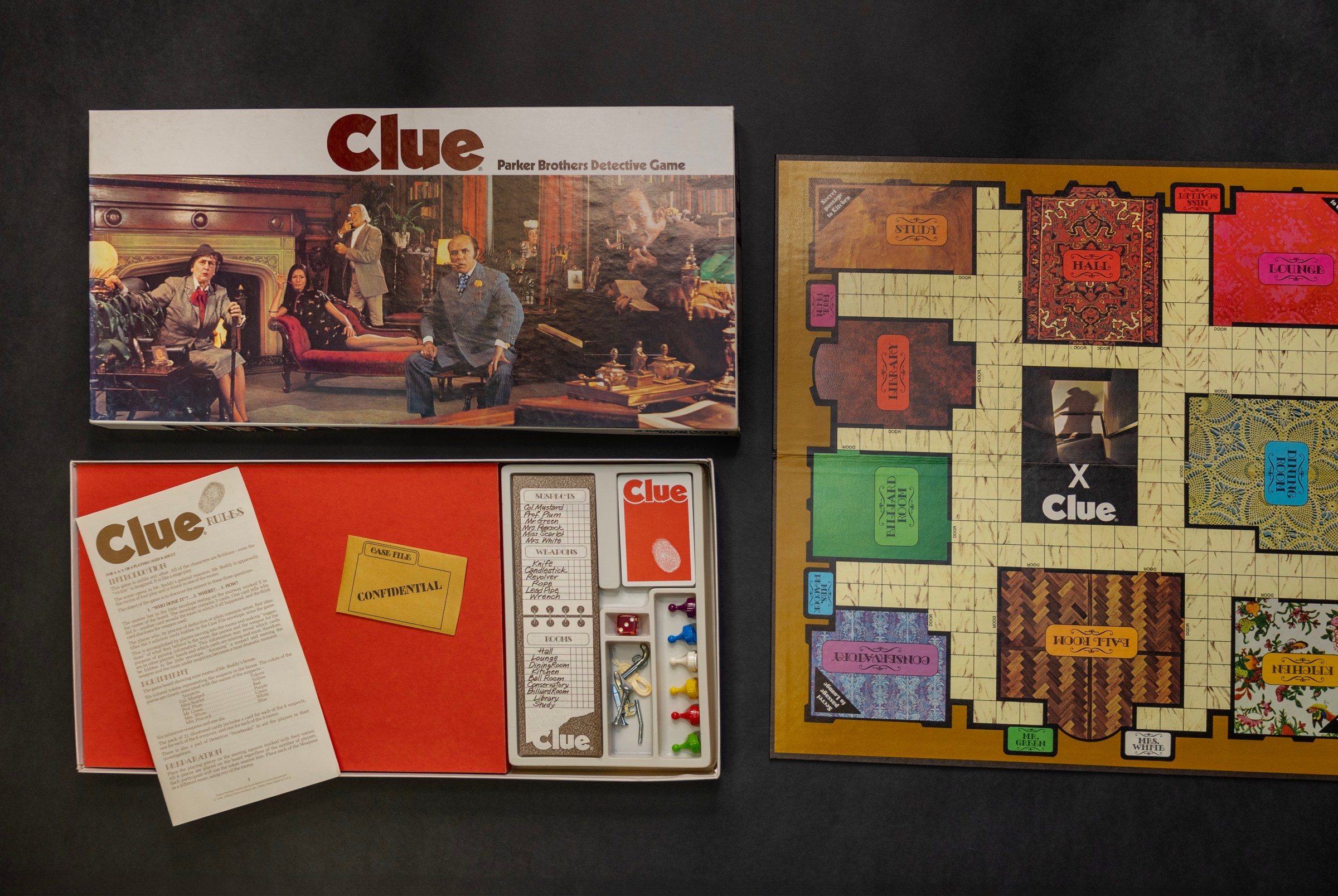 The 1972 edition of Clue, including the board, box, and accessories.